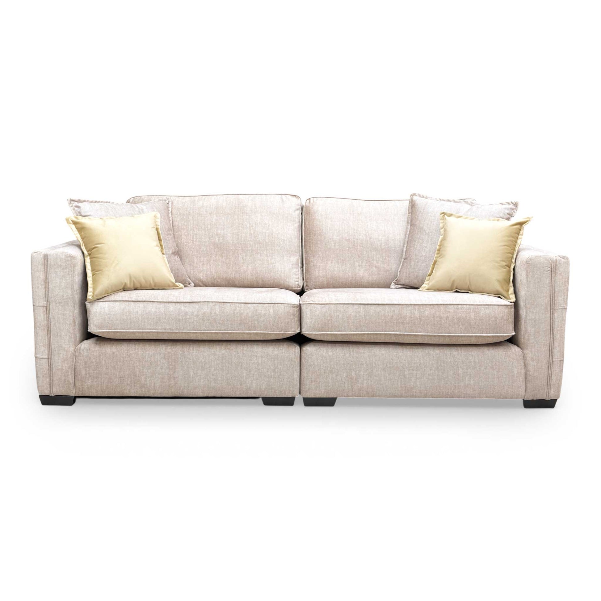 Front view of the Chelsea 4 seater split frame sofa in beige Vogue velvet with a formal back design.