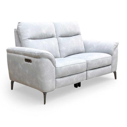 View of the cushioned armrests and deep-filled back cushions, highlighting the focus on real comfort and stylish detailing.