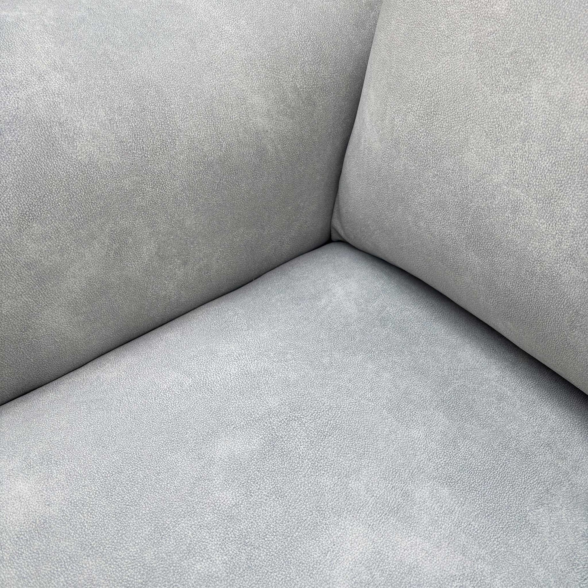Detail view of the Morgan sofa’s velvet fabric in Dexter Smoke, emphasizing the rich texture and high-quality finish of the upholstery.