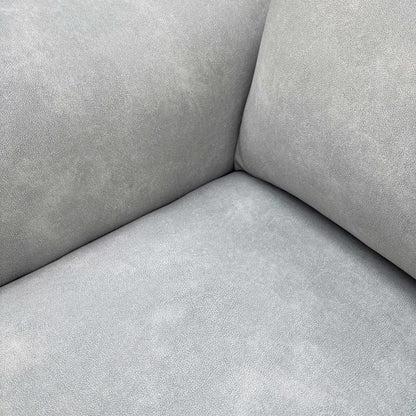 Detail view of the Morgan sofa’s velvet fabric in Dexter Smoke, emphasizing the rich texture and high-quality finish of the upholstery.