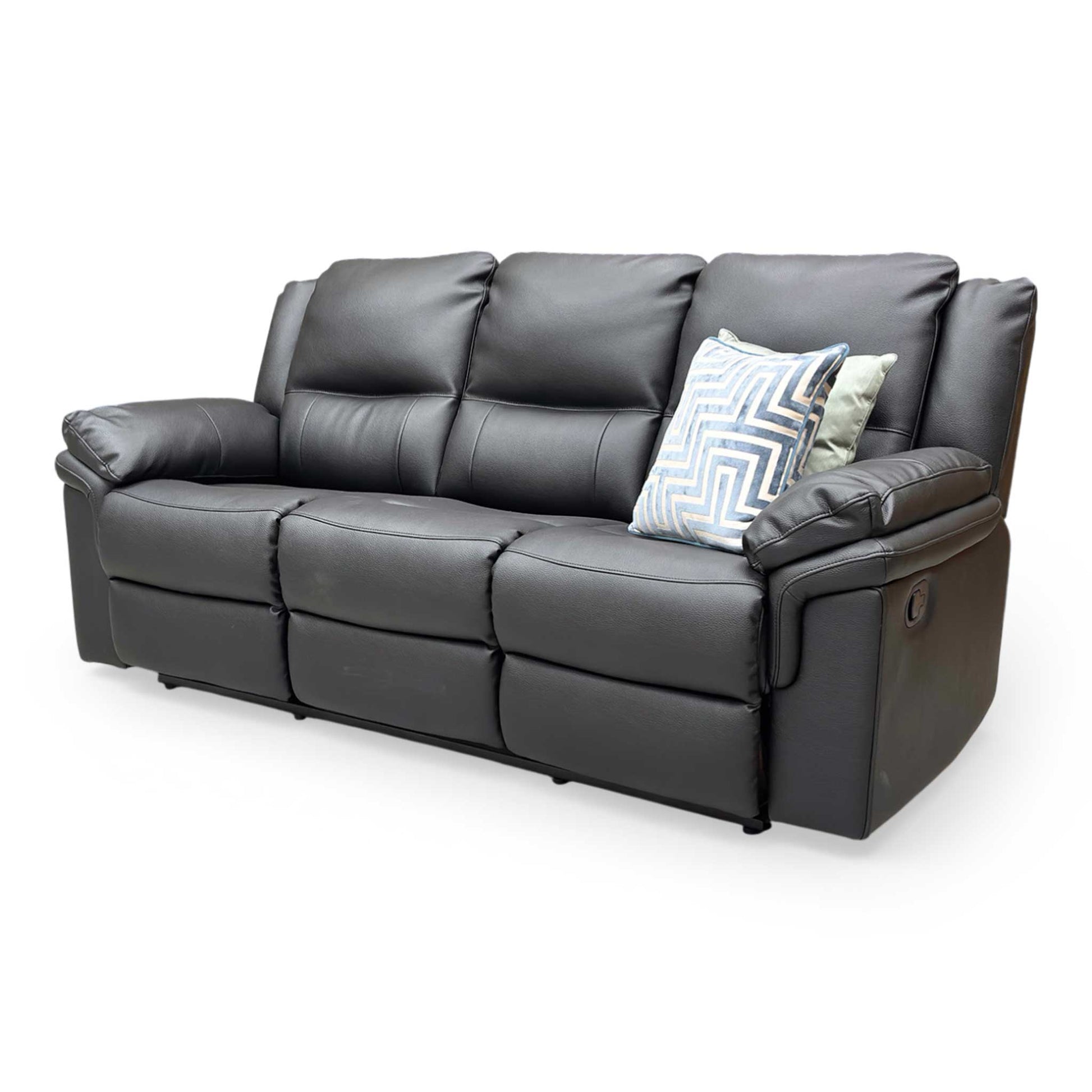 Side profile of the Albion sofa in a reclined position, emphasizing the extendable footrest and ergonomic back support.
