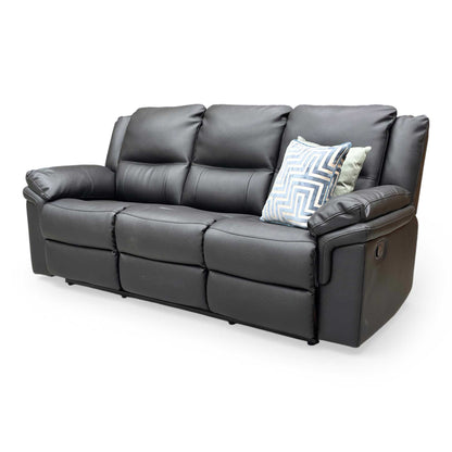Side profile of the Albion sofa in a reclined position, emphasizing the extendable footrest and ergonomic back support.
