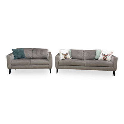 Front view of the Oslo Vogue 3 and 2-seater sofa set in stone velvet, showcasing its modern clean lines, deep padded seats, and neutral luxury living room aesthetic.