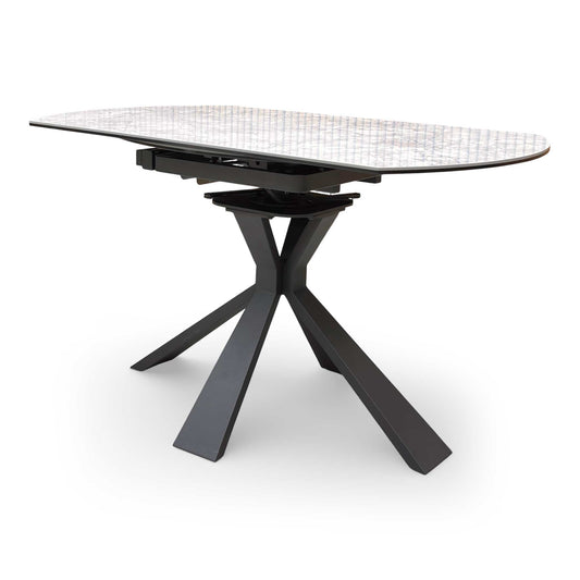Full view of the 'Crete' modern round extending dining table featuring a premium high-gloss white ceramic top with elegant grey veining and a striking matte black powder-coated metal star base.