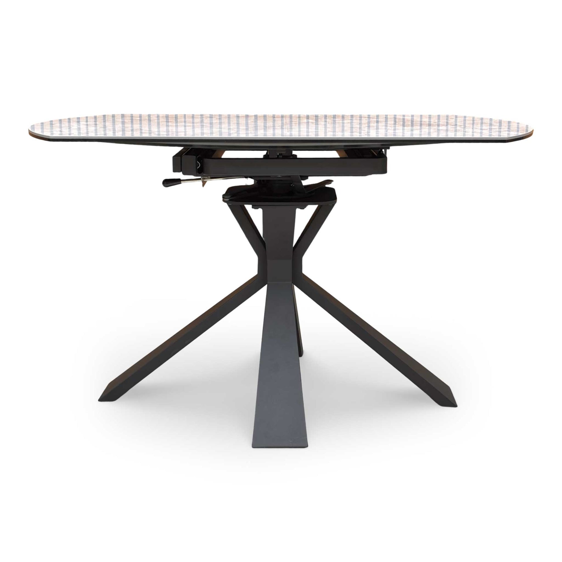 Front view of the Crete white ceramic dining table fully extended, comfortably styled with modern velvet swivel dining chairs.