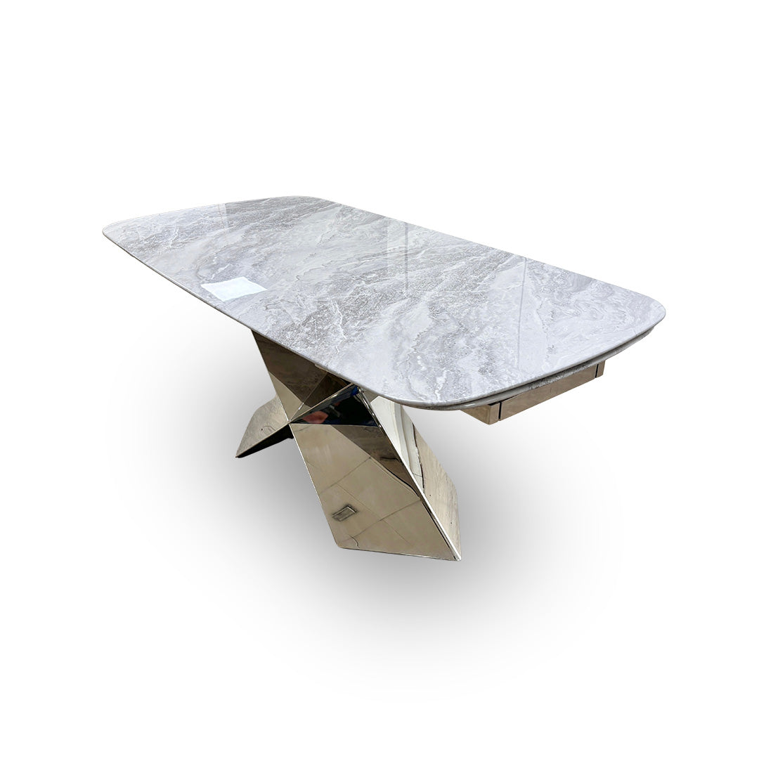 Shot of the table’s extending mechanism and base, demonstrating the functional design for seating additional guests.