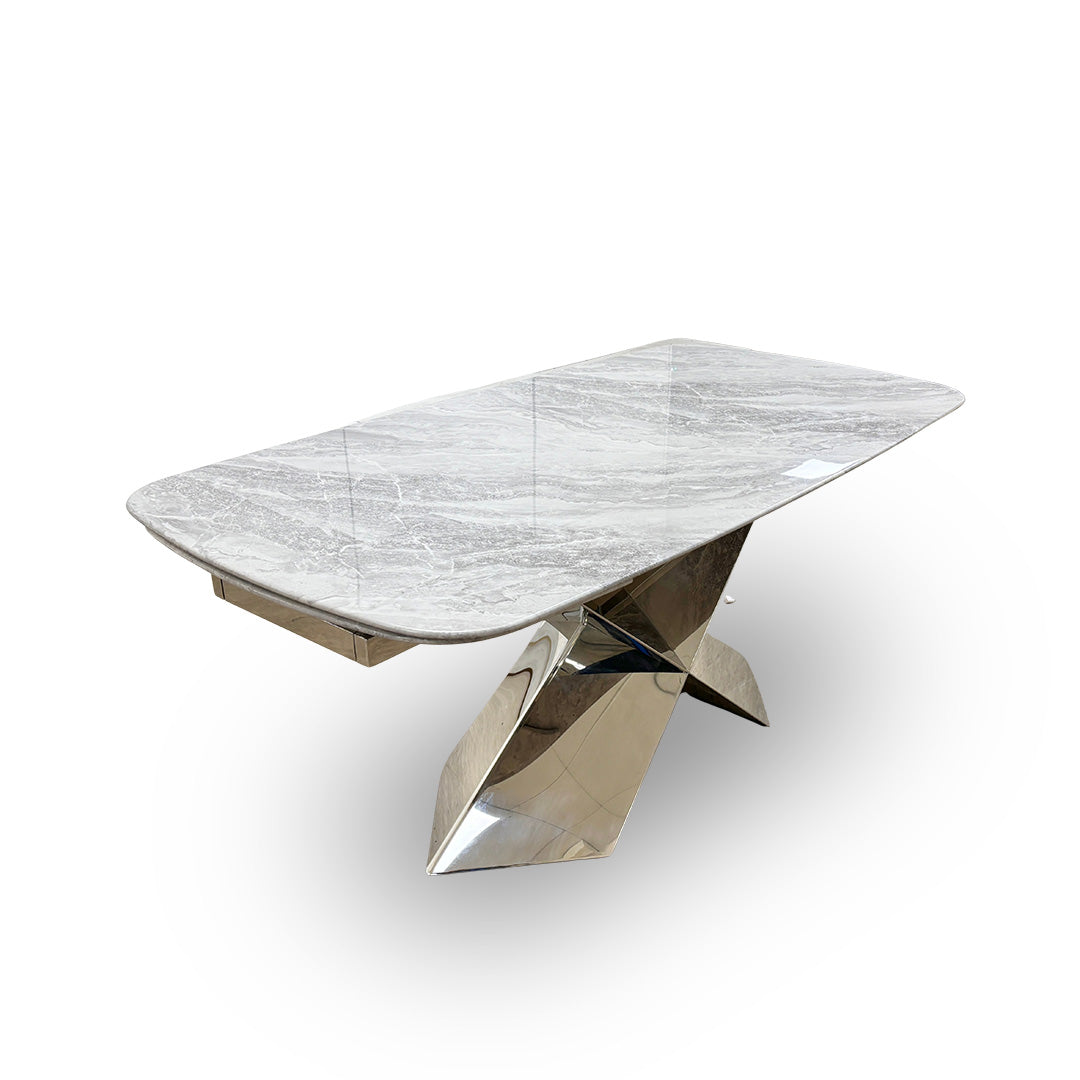High-angle view of the Gabana dining table, emphasizing the solid construction and sophisticated aesthetic of the white marble.
