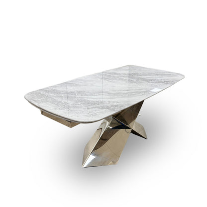 High-angle view of the Gabana dining table, emphasizing the solid construction and sophisticated aesthetic of the white marble.