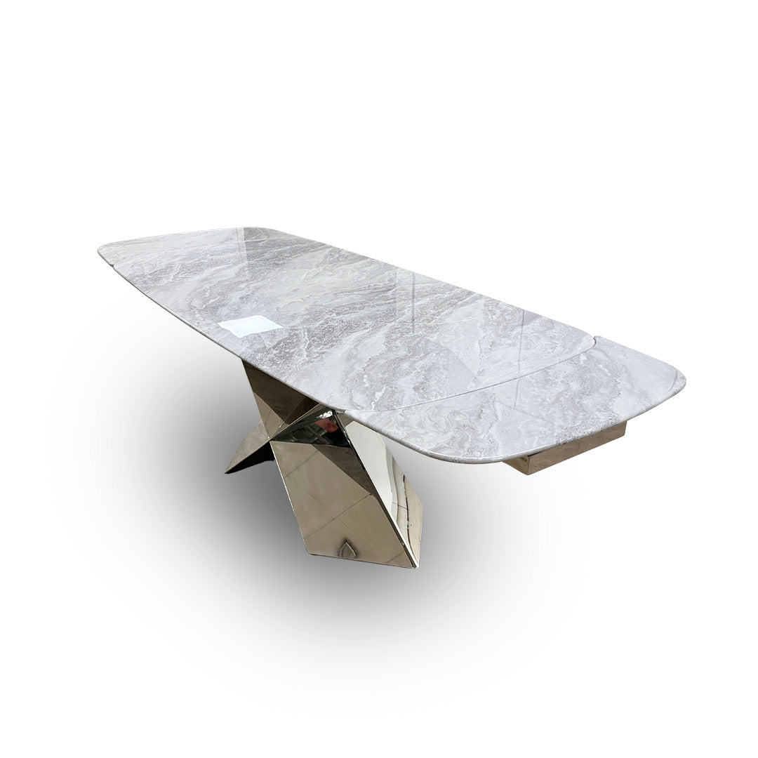 View of the Gabana table in its extended state, showing the seamless transition and increased surface area.