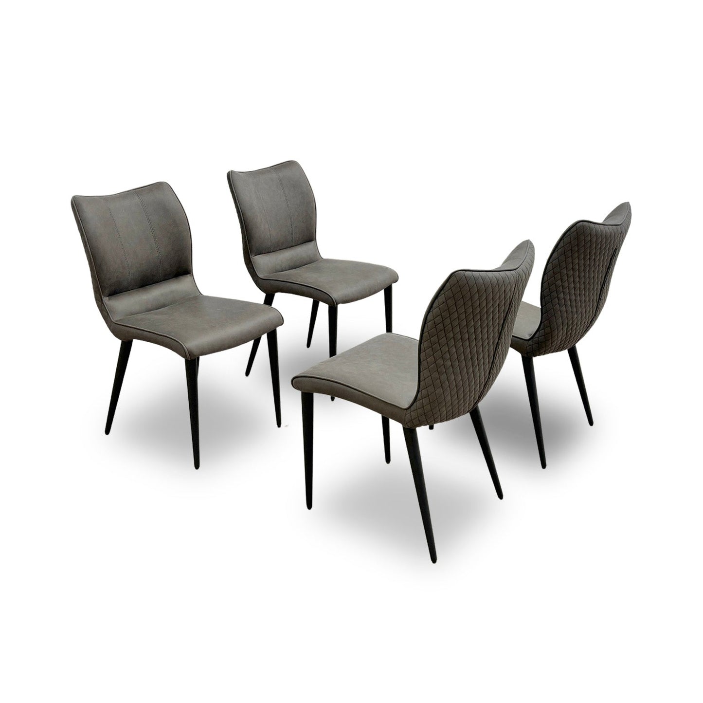 Full view of the set of 4 Murcia dining chairs in antiqued grey fabric with black metal legs.