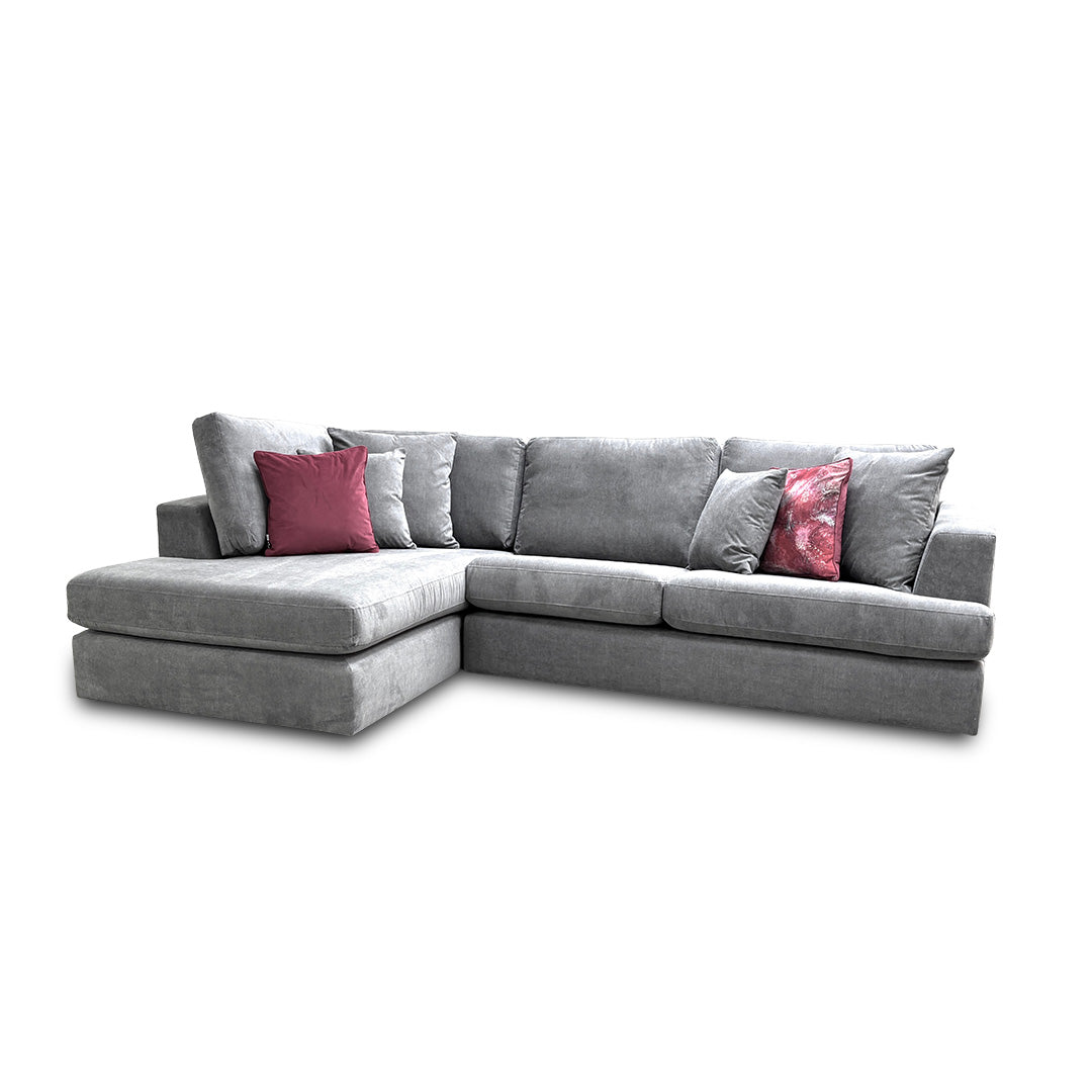 Front-facing view focusing on the wide seating cushions and the sleek silhouette of the left-hand facing configuration.