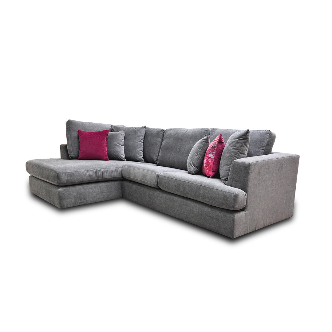 Side angled view of the sofa set, emphasizing the clean lines of the backrest and the spacious open-end chaise for lounging.