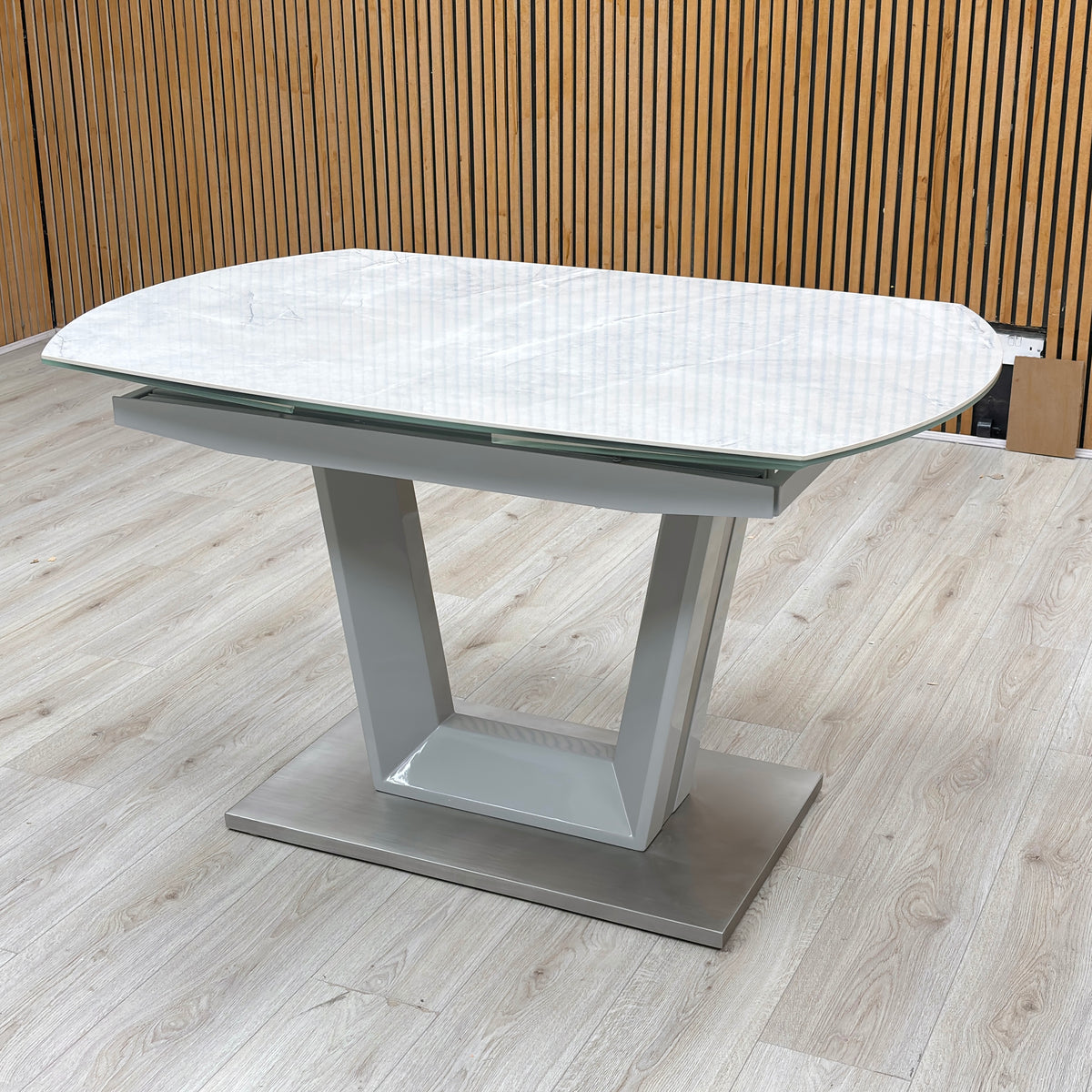 'Grigio' Ceramic Top Swivel Extending Dining Table with Grey Fabric Set of 4 Cantilever Dining Chairs