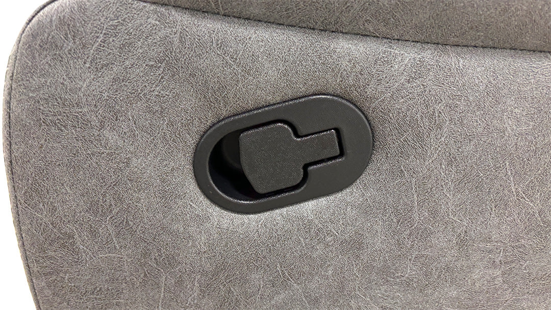 Detailed shot of the manual reclining pull-latch located on the side of the ‘Bennett’ fabric sofa.