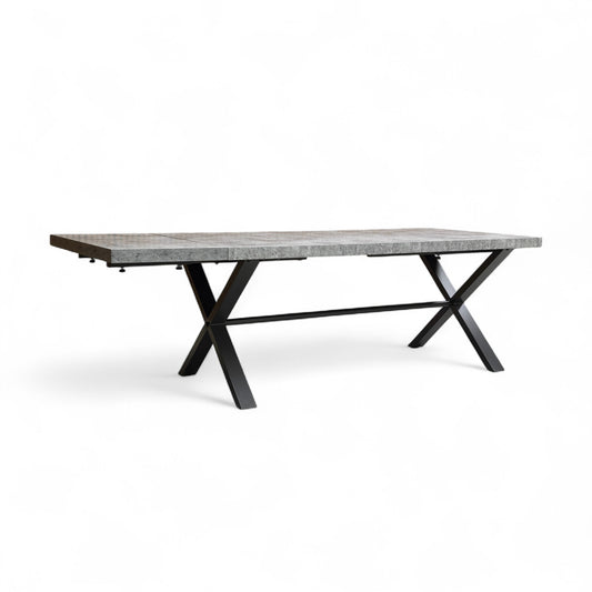 Full view of the 'Moon' grey concrete-look 190cm large dining table with dark grey industrial metal legs.