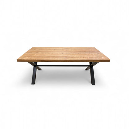 Close-up of the solid oak fixed tabletop, highlighting the natural wood grain, knots, and warm finish.