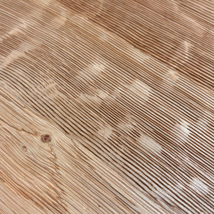 View focusing on the sturdy solid oak block legs and the construction of the Earth Dining Table base.