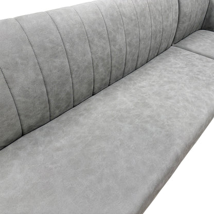 Close-up detail of the grey faux leather upholstery on the 'Grigio' dining bench, showing the subtle stitching and material texture.