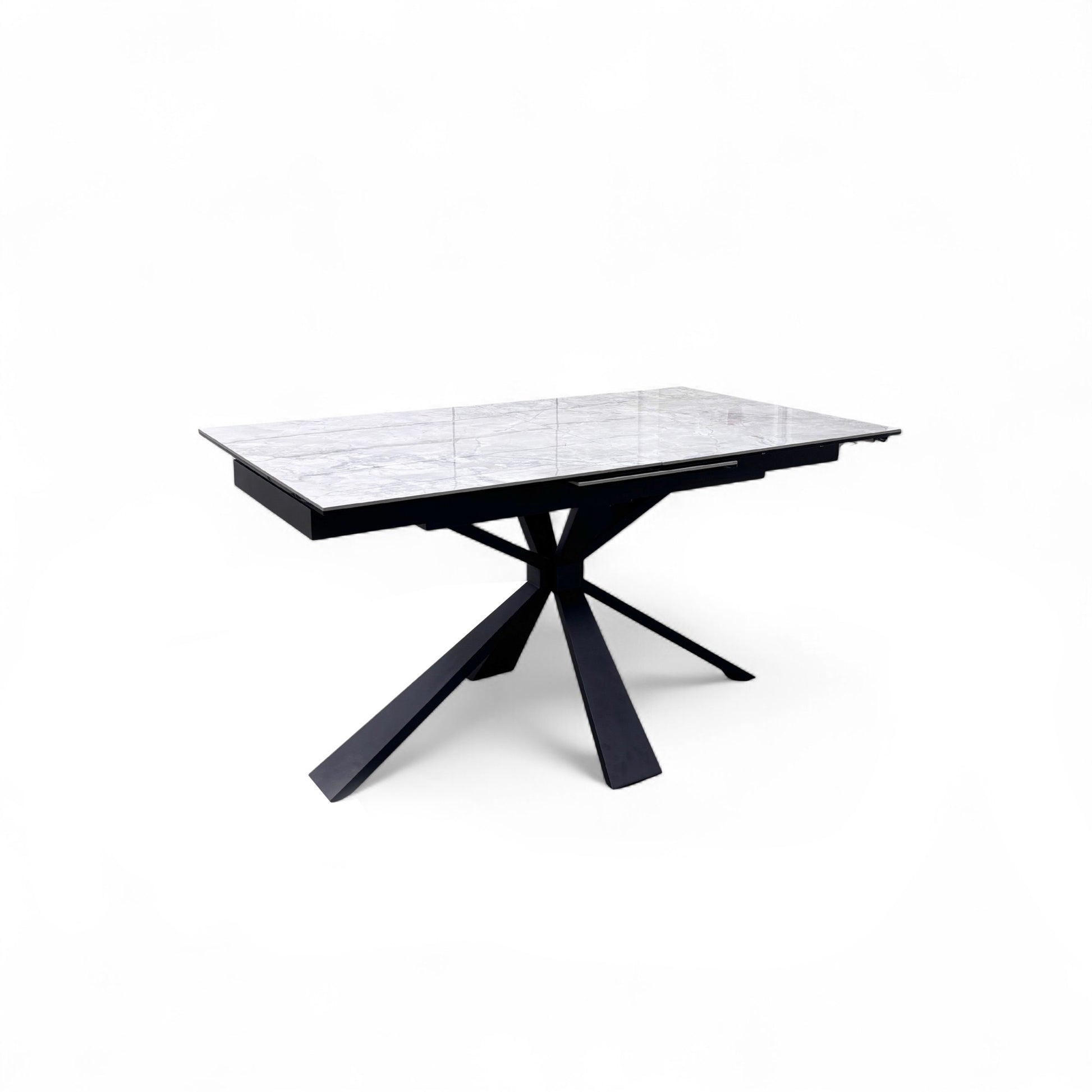 Detail view of the edge of the Crete dining table, showing the ceramic top's lamination to the tempered glass.