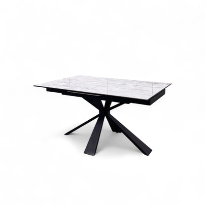 Close-up of the smooth, high-gloss white ceramic tabletop surface.