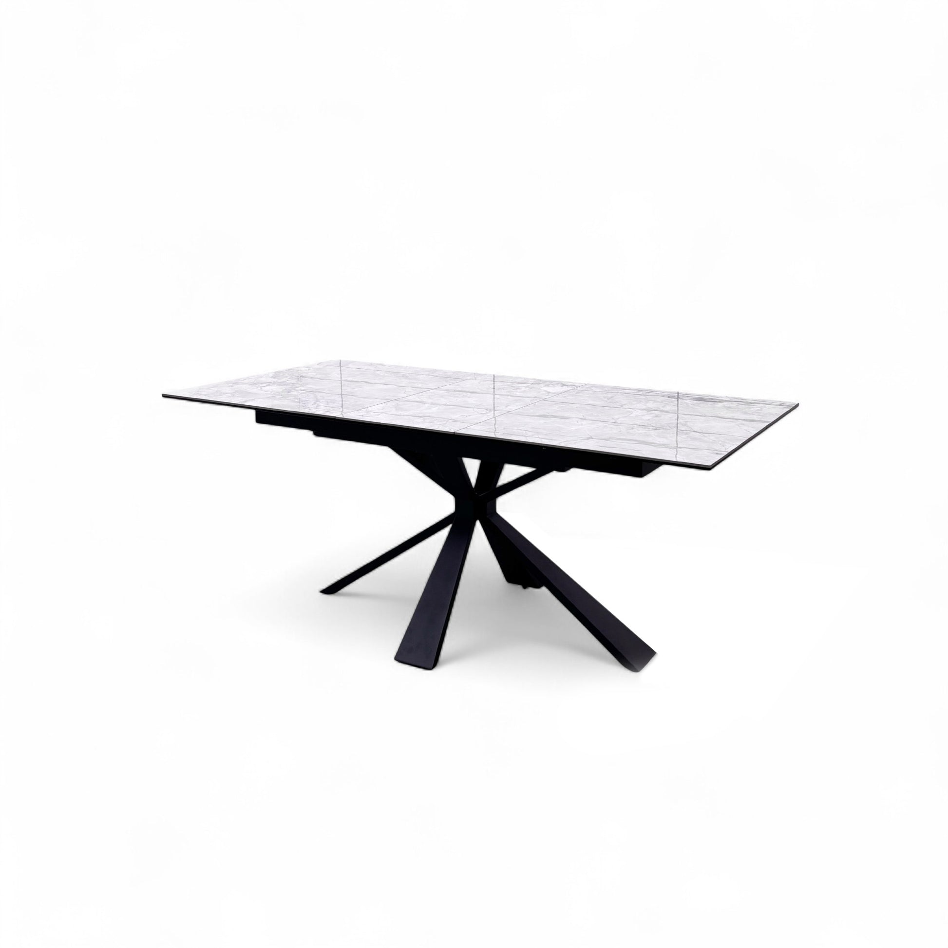 Angled shot of the Crete dining table, emphasizing the unique modern design of the black powder-coated metal base.