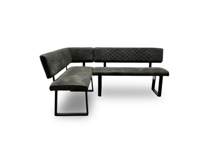 Full view of the 'Warrior' Left-Hand-Facing corner dining bench, upholstered in grey fabric with quilted-effect stitching and supported by U-shaped metal legs.