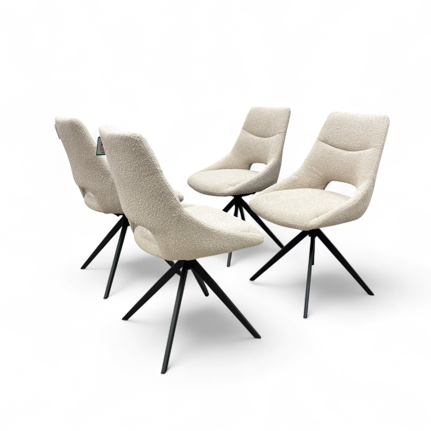 Side profile of the 'Barefoot' swivel chair, showing the contemporary silhouette and sturdy base.