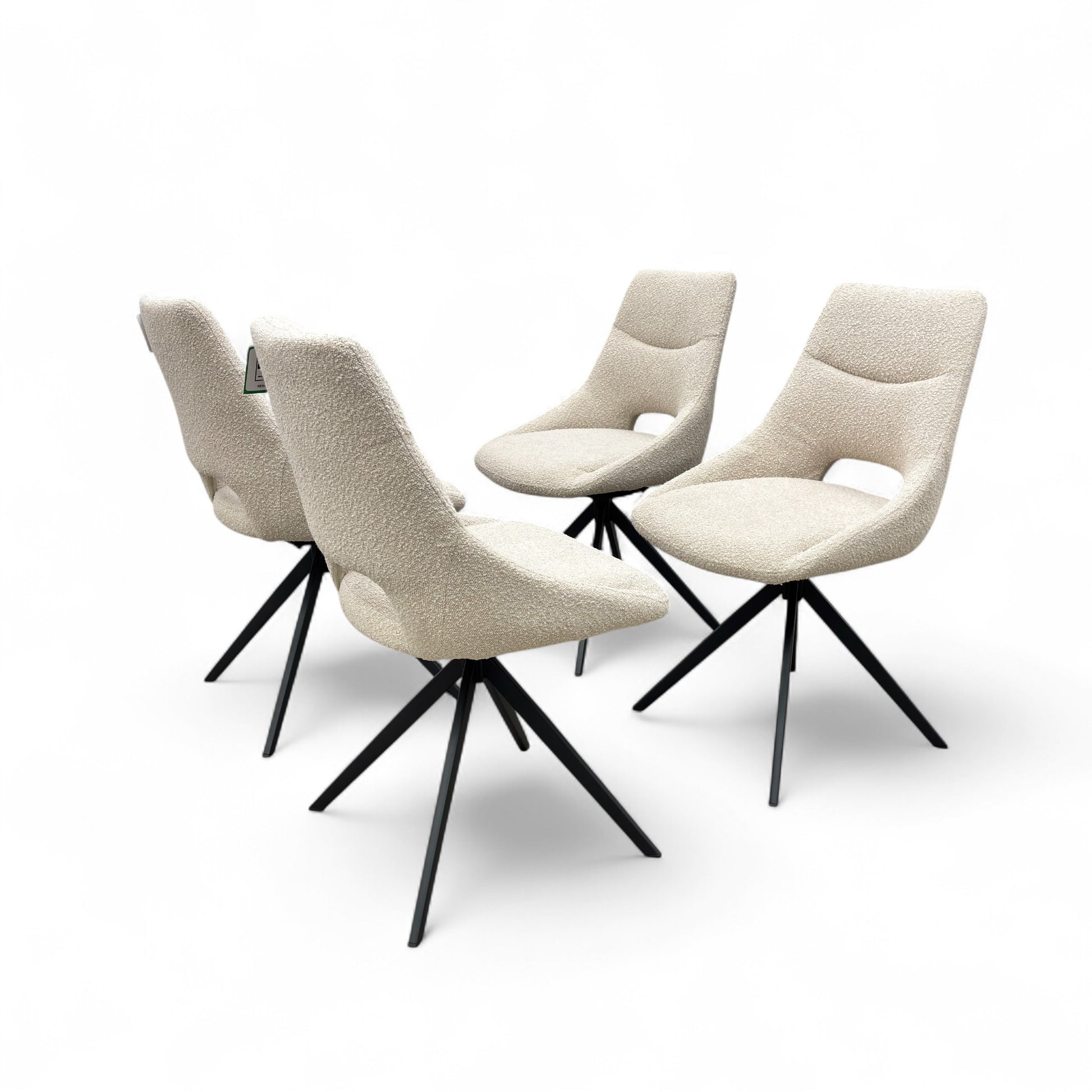 Side profile of the 'Barefoot' swivel chair, showing the contemporary silhouette and sturdy base.