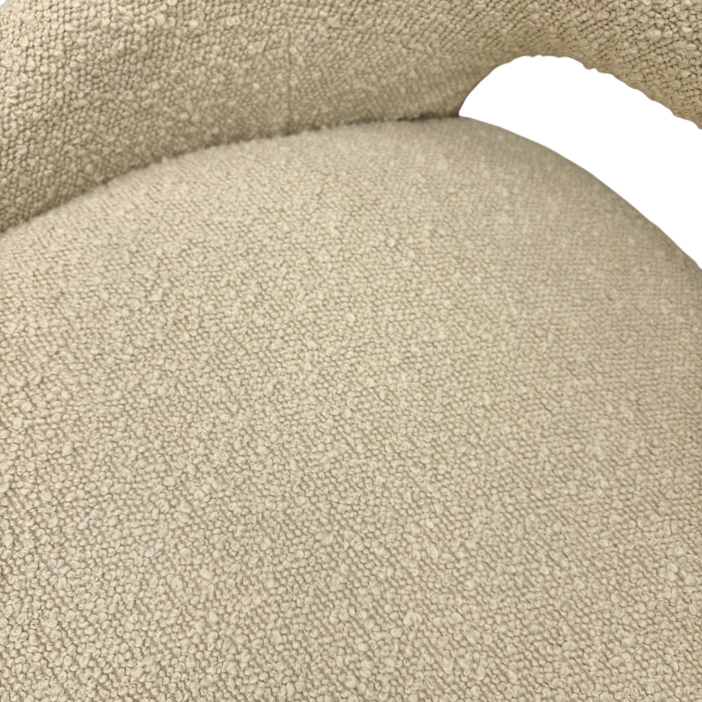 Close-up of the textured cream boucle fabric, highlighting the soft and durable weave.
