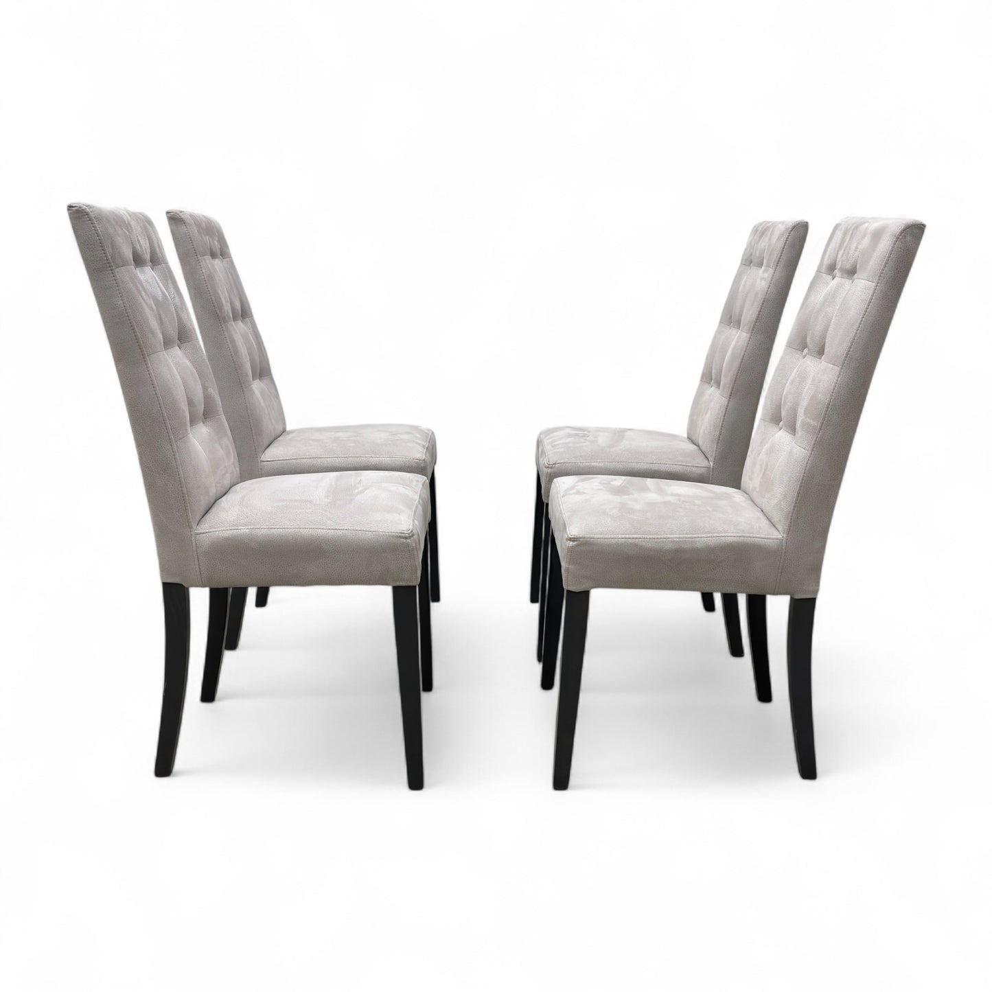 Full front view of a single 'Mia' high back dining chair in silver suede fabric, featuring classic button-tufting on the backrest.