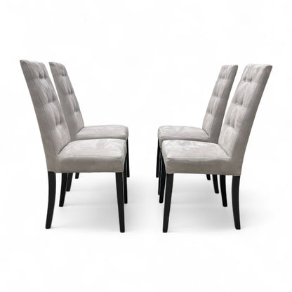 Full front view of a single 'Mia' high back dining chair in silver suede fabric, featuring classic button-tufting on the backrest.