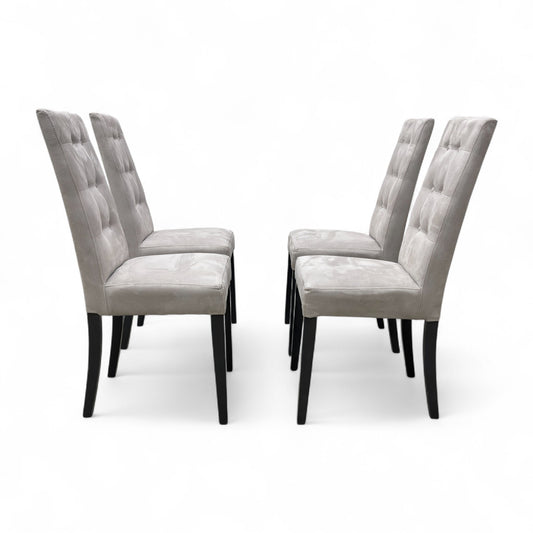 Full front view of a single 'Mia' high back dining chair in silver suede fabric, featuring classic button-tufting on the backrest.