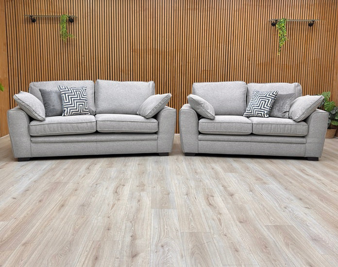 Lifestyle view of the Chalfont 3-seater sofa in Novak Grey fabric, showcasing the deep-filled back cushions and sleek armrests.