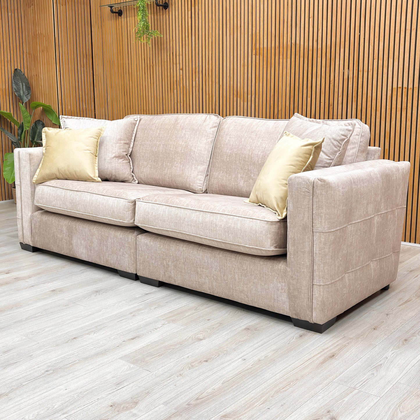 Lifestyle shot of the Chelsea beige velvet sofa, highlighting the plush velvet texture and formal backrest.