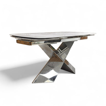 Side profile of the dining table emphasizing the sturdy pedestal support and modern silhouette.