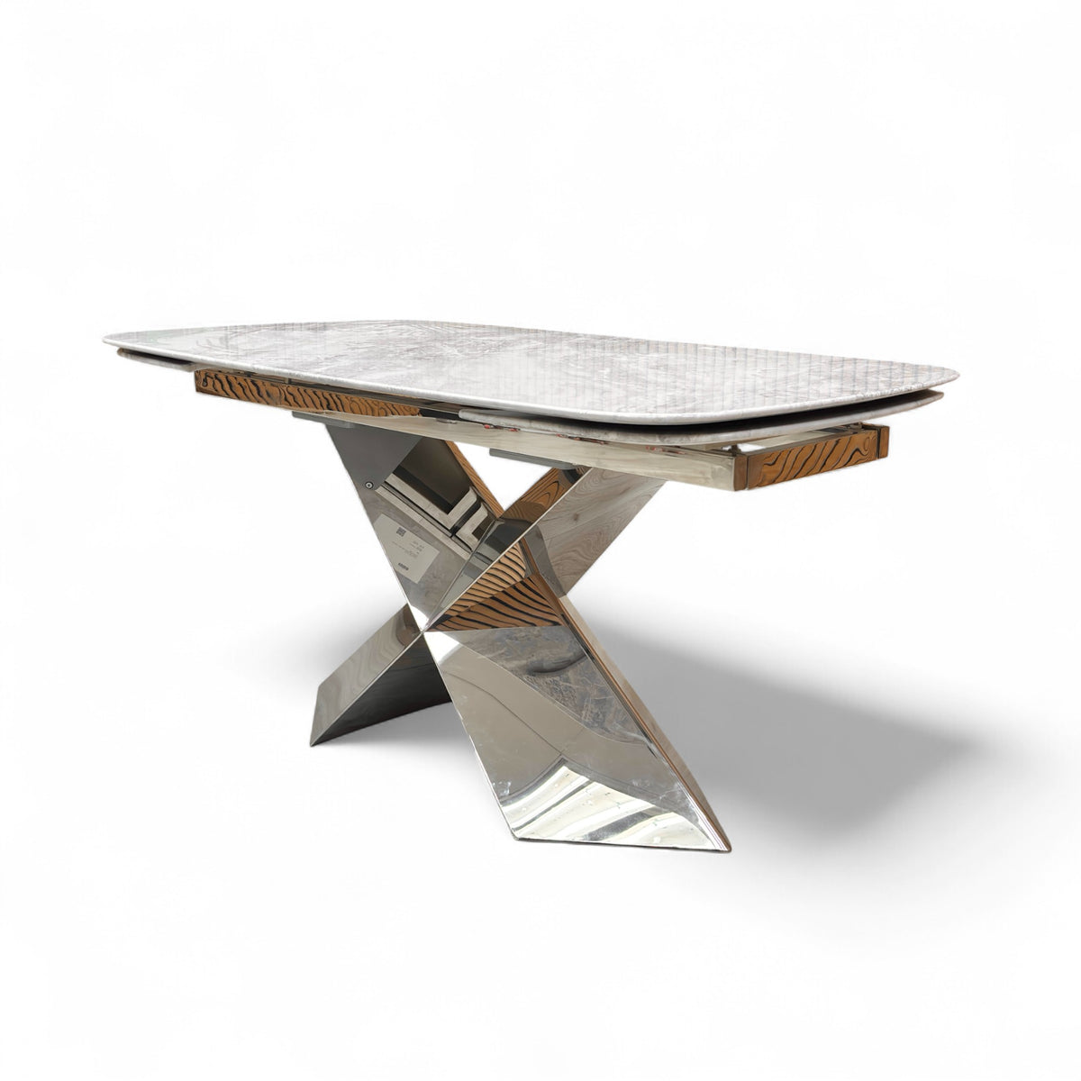 Side profile of the dining table emphasizing the sturdy pedestal support and modern silhouette.