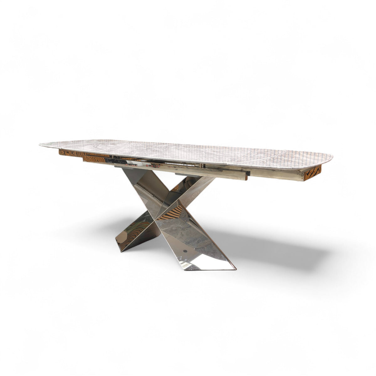 Side profile of the dining table emphasizing the sturdy pedestal support and modern silhouette.