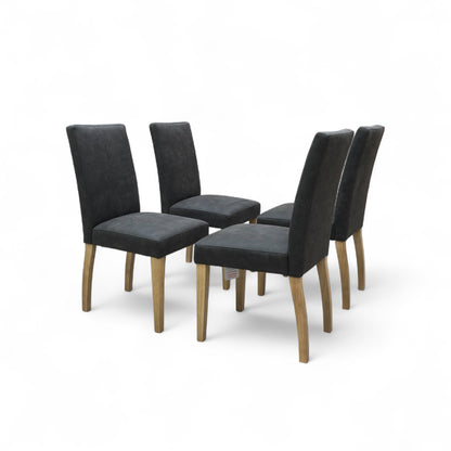 Full, frontal view of the Furnitureland 'Augusta' dining chair, upholstered in grey nubuck-look suede fabric with solid rubberwood legs.