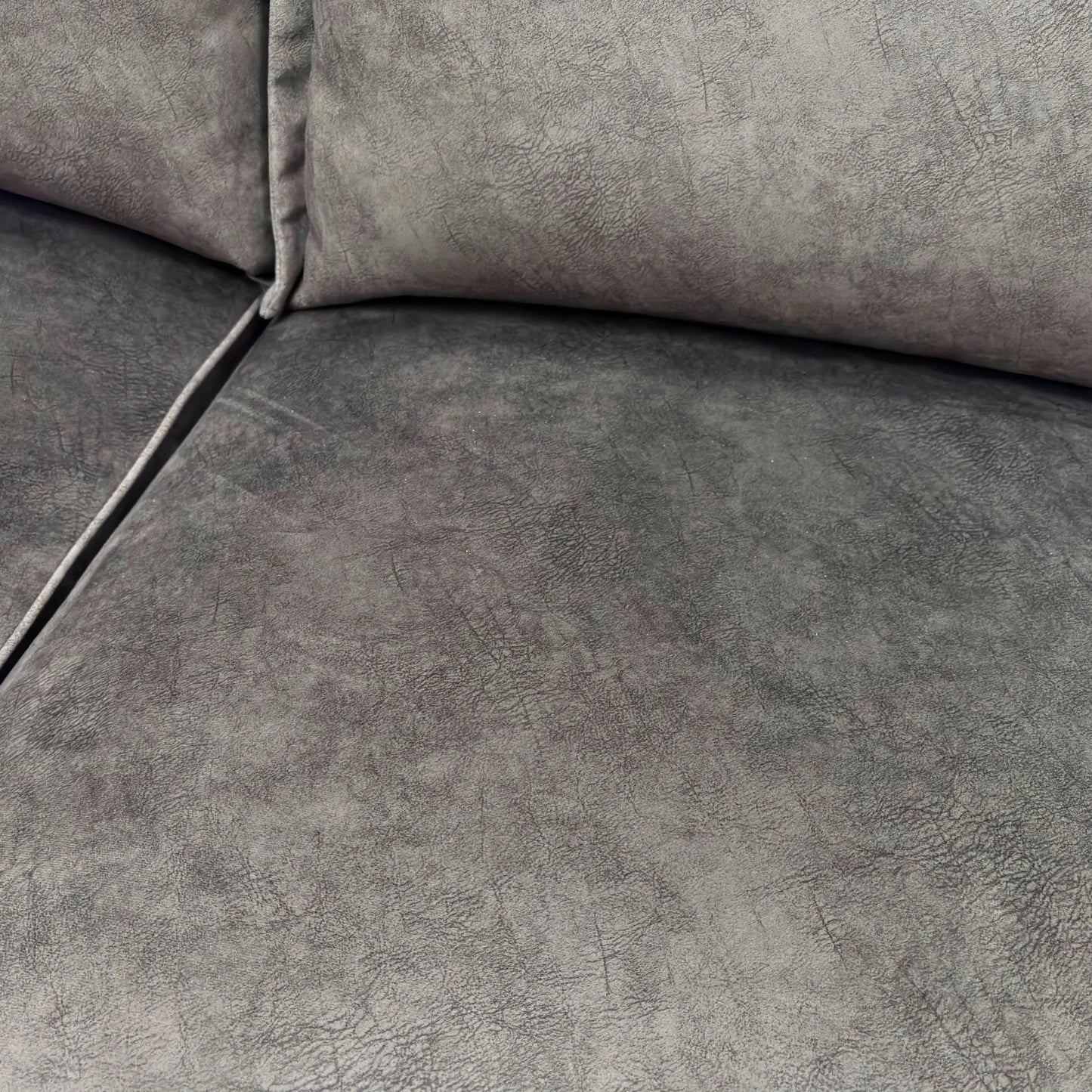 Closer view of the central seating area and back cushions of the full 'Dolcie' modular sofa.