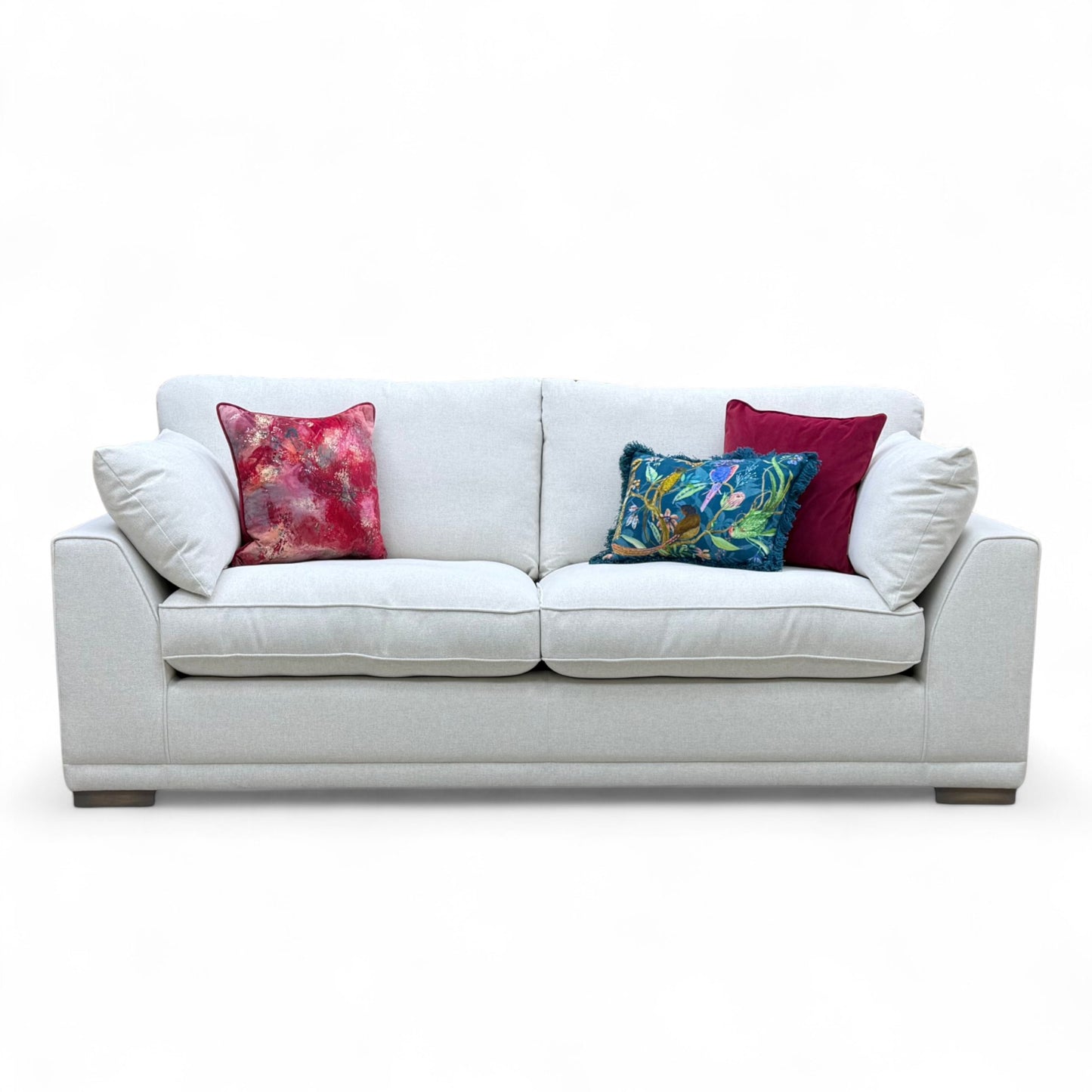 Three-quarter angle of the 'Dalton' Taupe Ashley Fabric Sofa, highlighting its generous size and relaxed modern style.