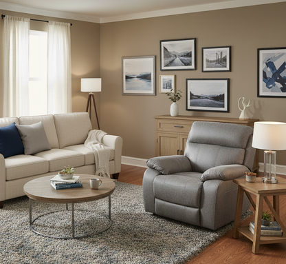 Living room with a gray recliner chair, beige sofa, and wooden coffee table.
