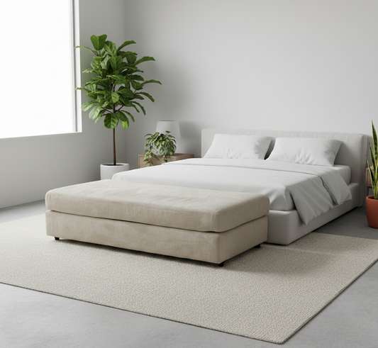 Beige bed with storage compartment in a modern bedroom setting