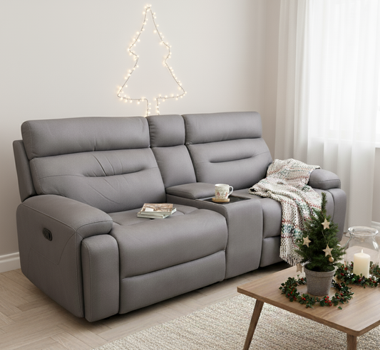 A sofa in a living room with minimal christmas decor 