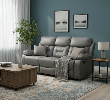 Gray sofa in a living room with a wooden coffee table, side table, and decorative elements.