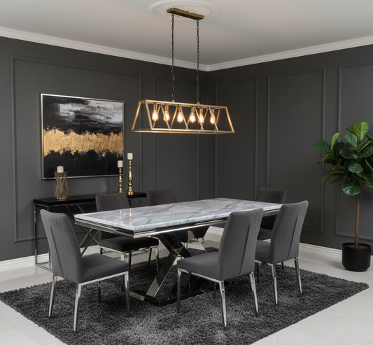 Modern dining room with marble table and gray chairs against a dark gray wall.