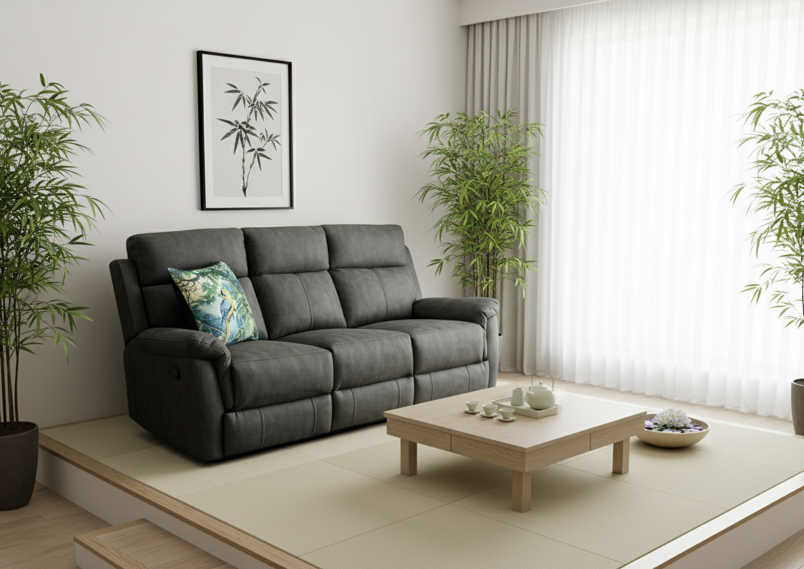 Modern living room with a gray sofa, wooden coffee table, and plants.