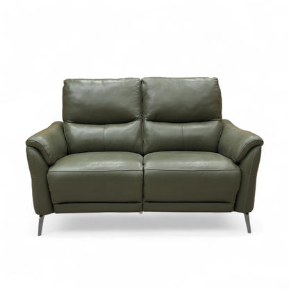 Three-quarter view of the 'Daytona' 2 Seater Sofa in Oslo Pine Green leather, highlighting the gently curved arms and generous seat cushions.