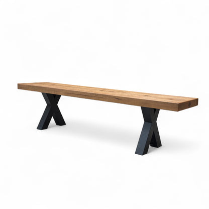 End-on perspective of the 180cm Solid Oak Bench, emphasizing the thick oak slab and the robust, chunky design.