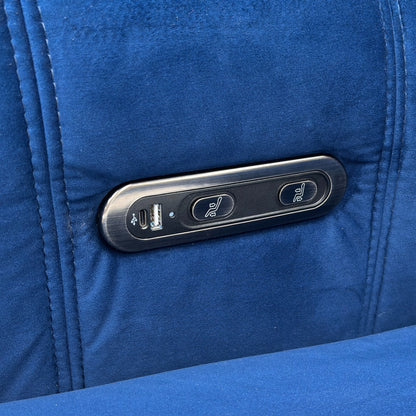 Close-up showing the adjustable manual headrest feature on the high back of the Elphaba Royal Blue Sofa.