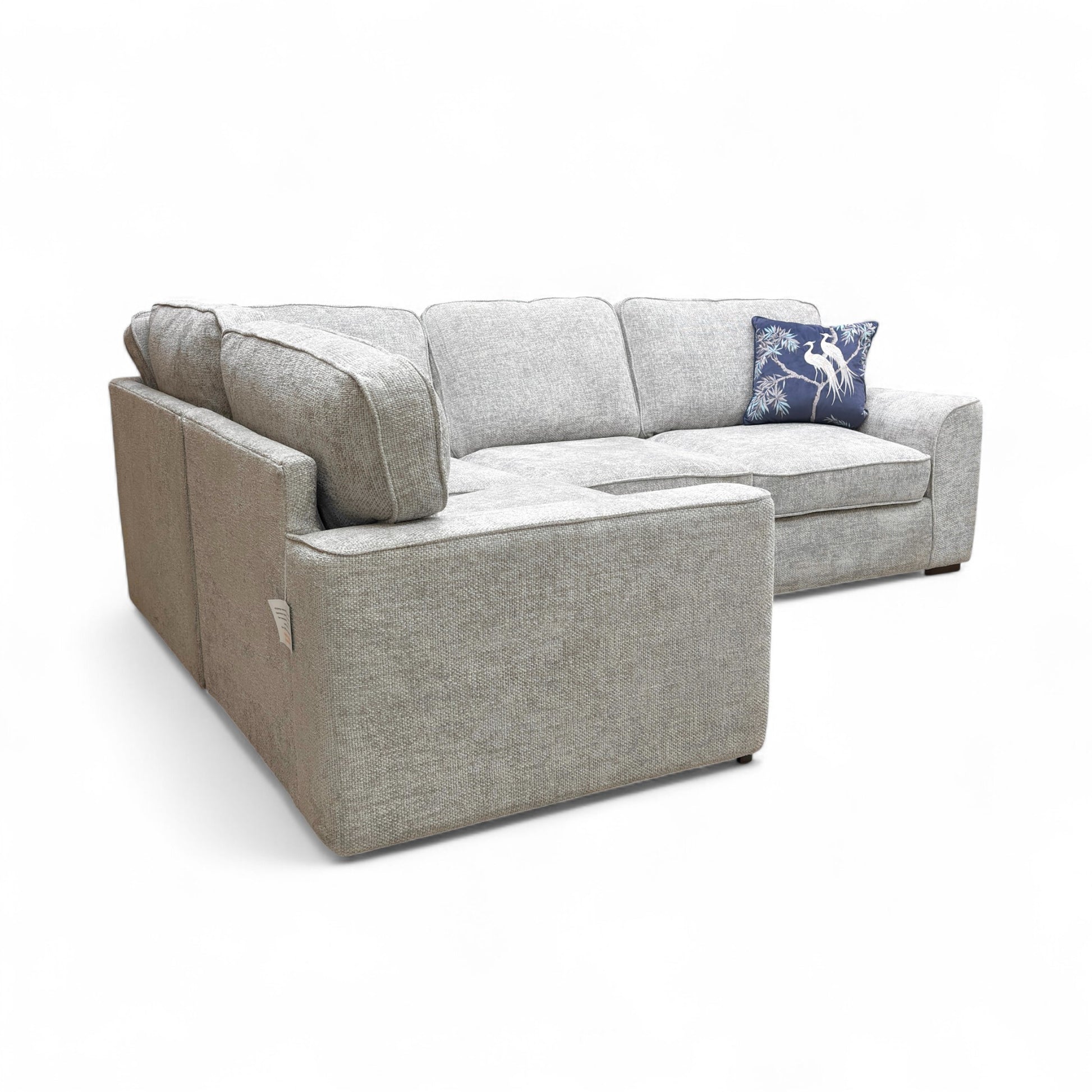 Full angle view of the 'Emilia' Small LHF Corner Sofa Bed, showcasing its compact size and configuration in a room setting.